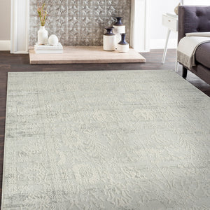 Homeroots 8' X 10' Ivory And Gray Floral Power Loom Distressed Stain Resistant Area Rug  Polyester 483040