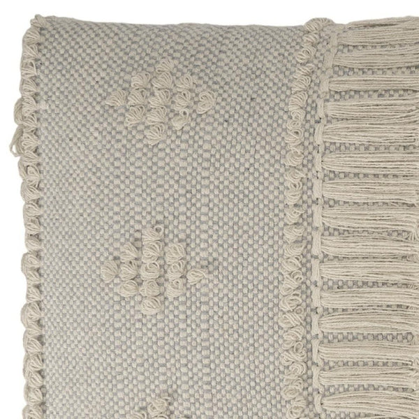 HomeRoots 47" Cream and Black Upholstered Bench with Bohemian Charm, Tassels, and Durable Design for Any Space 483463