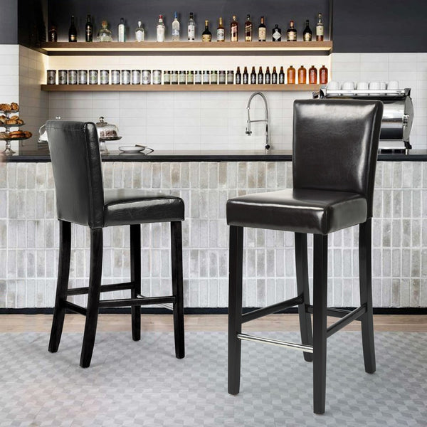 HomeRoots Set of Two 28" Brown Faux Leather Bar Height Stools with Black Steel Frame for Modern Spaces 483813