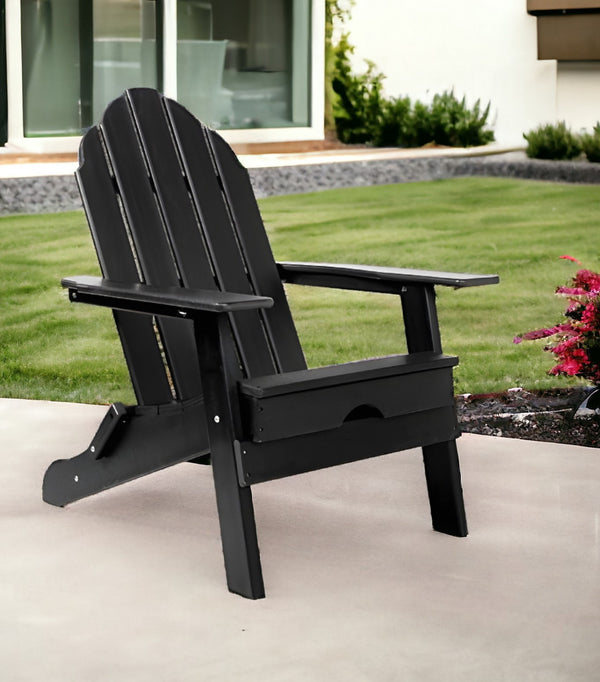 Homeroots 30" Chic Black Heavy Duty Plastic Adirondack Chair For Stylish Indoor & Outdoor Relaxation  Plastic 483904