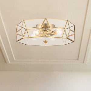 Brass Four Light Dimmable Flush Mount Chandelier with Clear Glass Shades for Modern Interiors