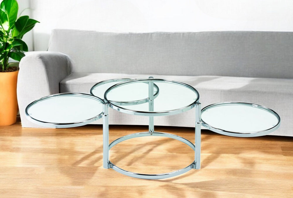 Homeroots 60" Clear And Silver Glass And Steel Round Nested Coffee Tables With Three Shelves   484680