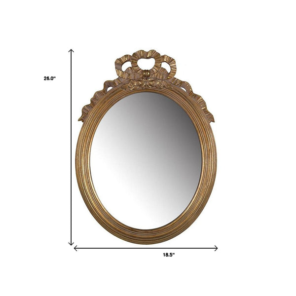 Homeroots 26" Gold Crowned Top Resin Framed Accent Mirror  Polyresin 485041