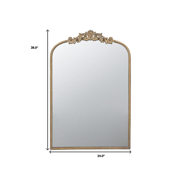Homeroots 36" Gold Arch Iron Framed Accent Mirror  50% Glass,30% Iron,20% Mdf 485052