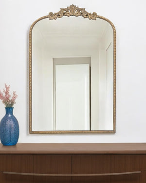 Homeroots 36" Gold Arch Iron Framed Accent Mirror  50% Glass,30% Iron,20% Mdf 485052
