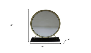 Homeroots 19" Faux Fur, Mirror, Black & Brass Finish Round Makeup Shaving Tabletop Mirror  Metal,Mirror,Upholstery,Composite Wood 485937