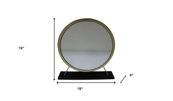 Homeroots 19" Faux Fur, Mirror, Black & Brass Finish Round Makeup Shaving Tabletop Mirror  Metal,Mirror,Upholstery,Composite Wood 485937