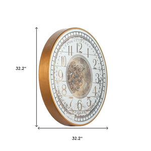 HomeRoots 32" Industrial Vintage Wall Clock with Gold & Silver Metal, Mirror Face, and Exposed Gear Design 485974
