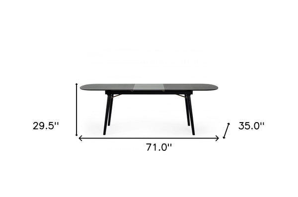 Homeroots 71" Black Rectangular Manufactured Wood Butterfly Leaf Dining Table   486019