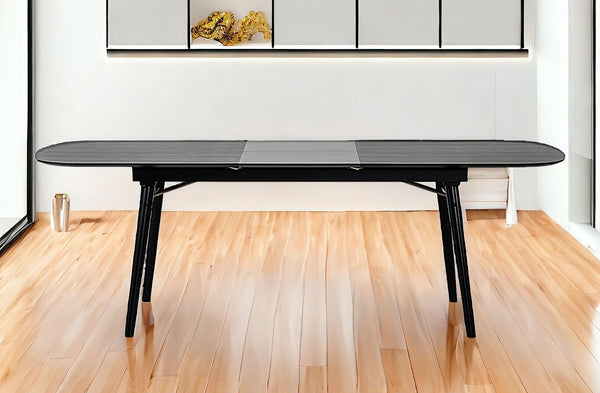 Homeroots 71" Black Rectangular Manufactured Wood Butterfly Leaf Dining Table   486019