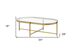 Homeroots 54" Gold And Clear Glass Oval Coffee Table   486051
