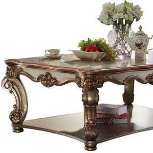 Homeroots 58" Gold Solid And Manufactured Wood Coffee Table With Shelf   486056