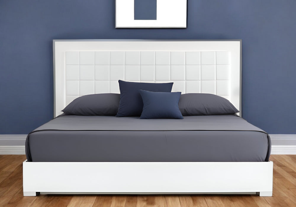 Homeroots White Lighted California King Bed Frame - Stylish Tufted Faux Leather & Stainless Steel Design!  Manufactured Wood,Steel,Faux Leather 486191