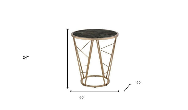 HomeRoots 24" Chic Round End Table with Champagne Metal Base & Faux Black Marble Top - Versatile & Stylish 486365