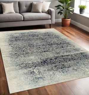 HomeRoots 5' Navy Blue and Ivory Medallion Area Rug - Stylish, Stain-Resistant, Perfect for Family Spaces 5' X 8' 486645