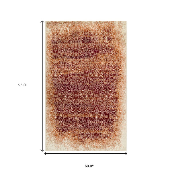 Homeroots 5' X 8' Orange Medallion Stain Resistant Area Rug  Polypropylene 486646