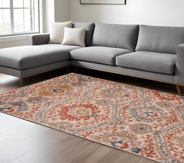 HomeRoots 7' Orange and Ivory Floral Area Rug - Durable, Stain Resistant, Perfect for High-Traffic Homes! 7' X 9' 486714
