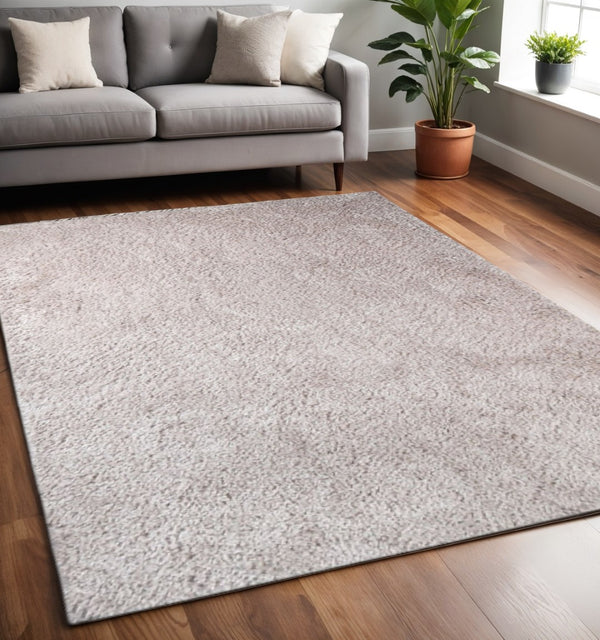 HomeRoots 5' Plush Beige Handmade Shag Area Rug - Cozy, Stain-Resistant Comfort for Family and Pet Spaces 5' X 8' 486791