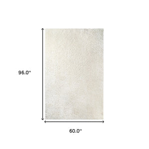Homeroots 5' X 8' Ivory Shag Stain Resistant Area Rug  Polypropylene 486794