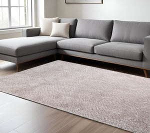 HomeRoots 5' Plush Beige Handmade Shag Area Rug - Cozy, Stain-Resistant Comfort for Family and Pet Spaces 8' X 10' 486797