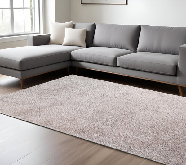 HomeRoots 5' Plush Beige Handmade Shag Area Rug - Cozy, Stain-Resistant Comfort for Family and Pet Spaces 8' X 10' 486797