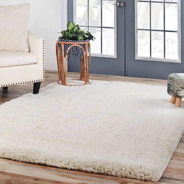 Homeroots 8' X 10' Ivory Shag Stain Resistant Area Rug  Polypropylene 486800