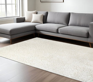 HomeRoots 5' Luxurious Ivory Shag Handmade Area Rug for Soft Comfort, Stain Resistance, and Timeless Style 8' X 10' 486800