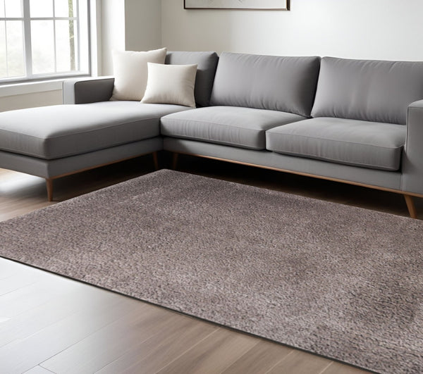 HomeRoots 8' Taupe Shag Area Rug - Handcrafted Luxury for Cozy Living Spaces with Stain-Resistant Comfort 8' X 10' 486802