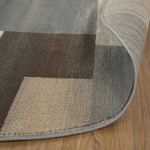 Homeroots 5' Round Grey Round Patchwork Power Loom Stain Resistant Area Rug  Polypropylene 486846