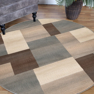 Homeroots 5' Round Grey Round Patchwork Power Loom Stain Resistant Area Rug  Polypropylene 486846