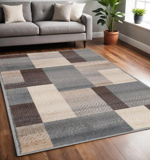 Homeroots 5' X 8' Grey Patchwork Power Loom Stain Resistant Area Rug  Polypropylene 486850