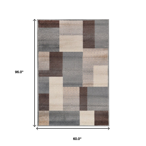 Homeroots 5' X 8' Grey Patchwork Power Loom Stain Resistant Area Rug  Polypropylene 486850