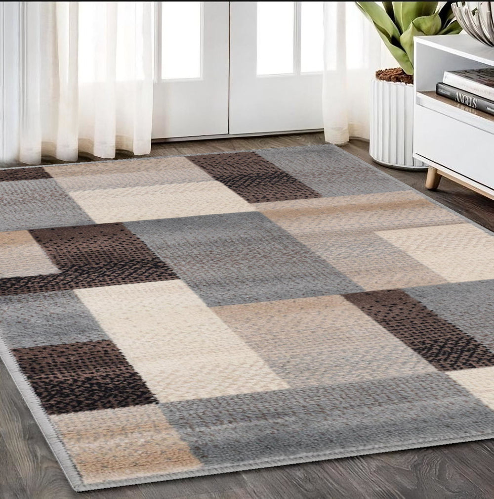 Homeroots 5' X 8' Grey-brown Patchwork Power Loom Stain Resistant Area Rug  Polypropylene 486851