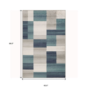 Homeroots 5' X 8' Teal And Gray Patchwork Power Loom Stain Resistant Area Rug  Polypropylene 486852