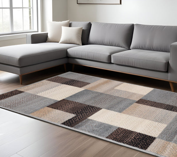 Homeroots 7' X 9' Grey-brown Patchwork Power Loom Stain Resistant Area Rug  Polypropylene 486856