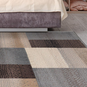 Homeroots 7' X 9' Grey-brown Patchwork Power Loom Stain Resistant Area Rug  Polypropylene 486856