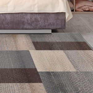Homeroots 7' X 9' Grey Patchwork Power Loom Stain Resistant Area Rug  Polypropylene 486857