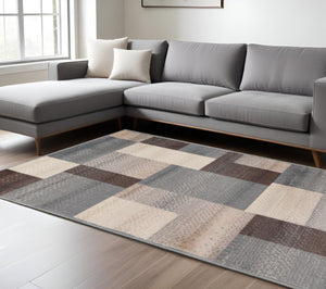HomeRoots 7' Versatile Gray Tan Brown Patchwork Area Rug - Durable, Stain-Resistant Design for Everyday Living 7' X 9' 486857
