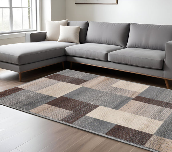 Homeroots 9' X 12' Grey Patchwork Power Loom Stain Resistant Area Rug  Polypropylene 486866