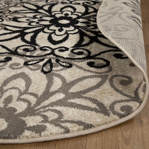 Homeroots 5' Round Tan Gray And Black Round Floral Medallion Stain Resistant Area Rug  Polypropylene 486931