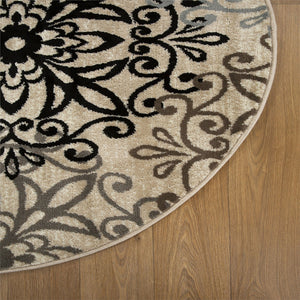 Homeroots 5' Round Tan Gray And Black Round Floral Medallion Stain Resistant Area Rug  Polypropylene 486931