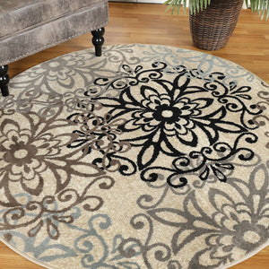 Homeroots 5' Round Tan Gray And Black Round Floral Medallion Stain Resistant Area Rug  Polypropylene 486931