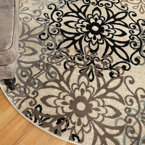 Homeroots 5' Round Tan Gray And Black Round Floral Medallion Stain Resistant Area Rug  Polypropylene 486931