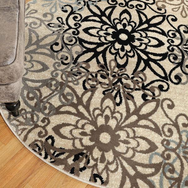 Homeroots 5' Round Tan Gray And Black Round Floral Medallion Stain Resistant Area Rug  Polypropylene 486931