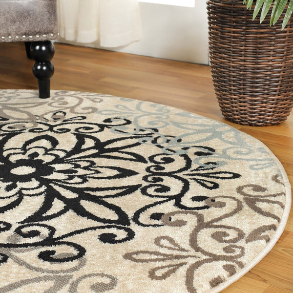 Homeroots 5' Round Tan Gray And Black Round Floral Medallion Stain Resistant Area Rug  Polypropylene 486931