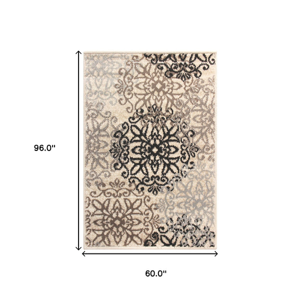 Homeroots 5' X 8' Tan Gray And Black Floral Medallion Stain Resistant Area Rug  Polypropylene 486933