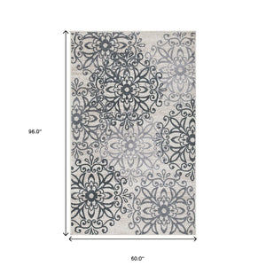 Homeroots 5' X 8' Oatmeal And Gray Medallion Power Loom Stain Resistant Area Rug  Polypropylene 486937