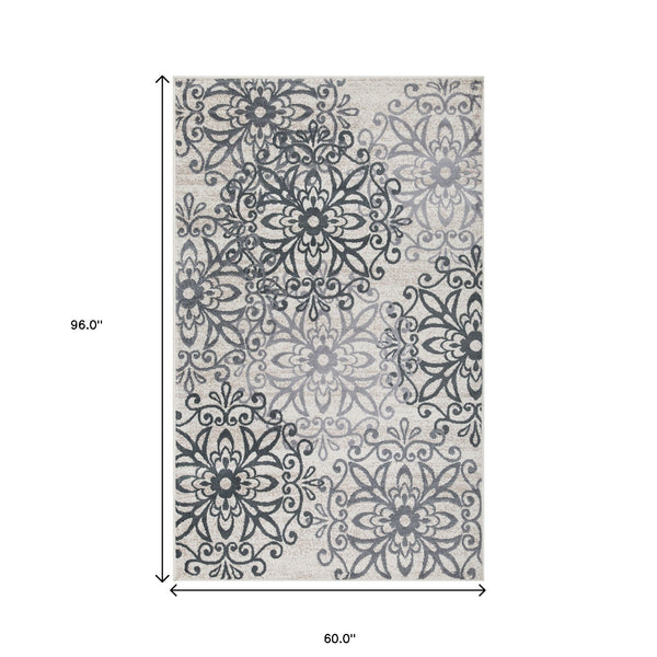 Homeroots 5' X 8' Oatmeal And Gray Medallion Power Loom Stain Resistant Area Rug  Polypropylene 486937
