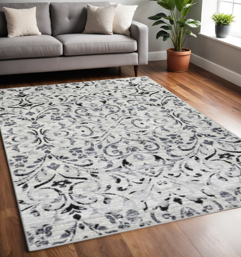 HomeRoots 5' Black and Gray Floral Vines Area Rug - Elegant, Soft, and Durable for Modern Living Spaces 5' X 8' 486954