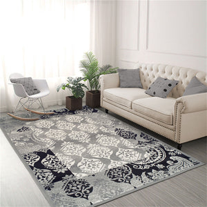 Homeroots 5' X 8' Black And Gray Damask Power Loom Distressed Stain Resistant Area Rug  Polypropylene 486969